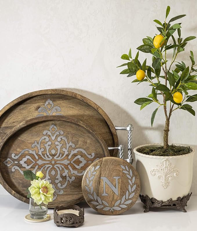 Cream Stoneware Planter on Metal Acanthus Leaf Base.